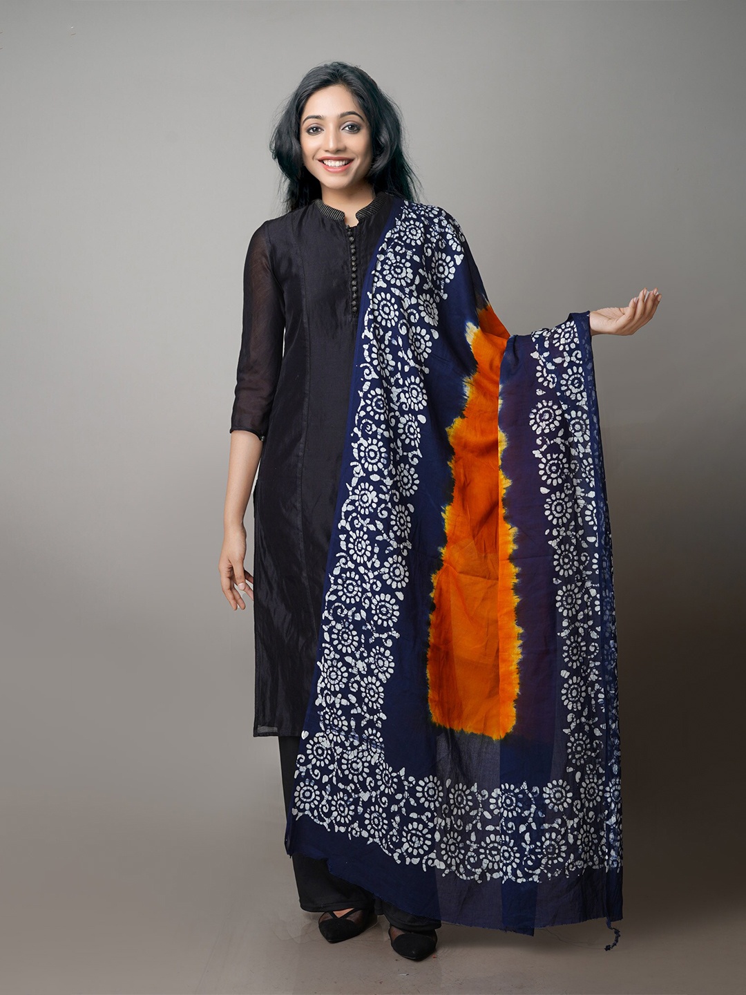 

Unnati Silks Orange & Blue Ethnic Motifs Dyed Pure Cotton Batik Dupatta