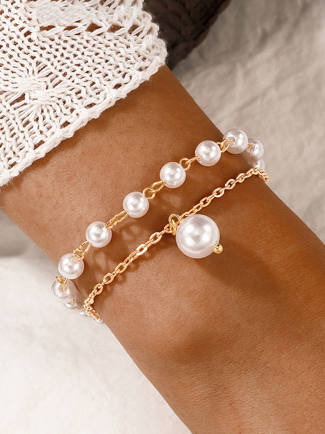 

Jewels Galaxy Women Gold-Toned & White Gold-Plated Charm Bracelet