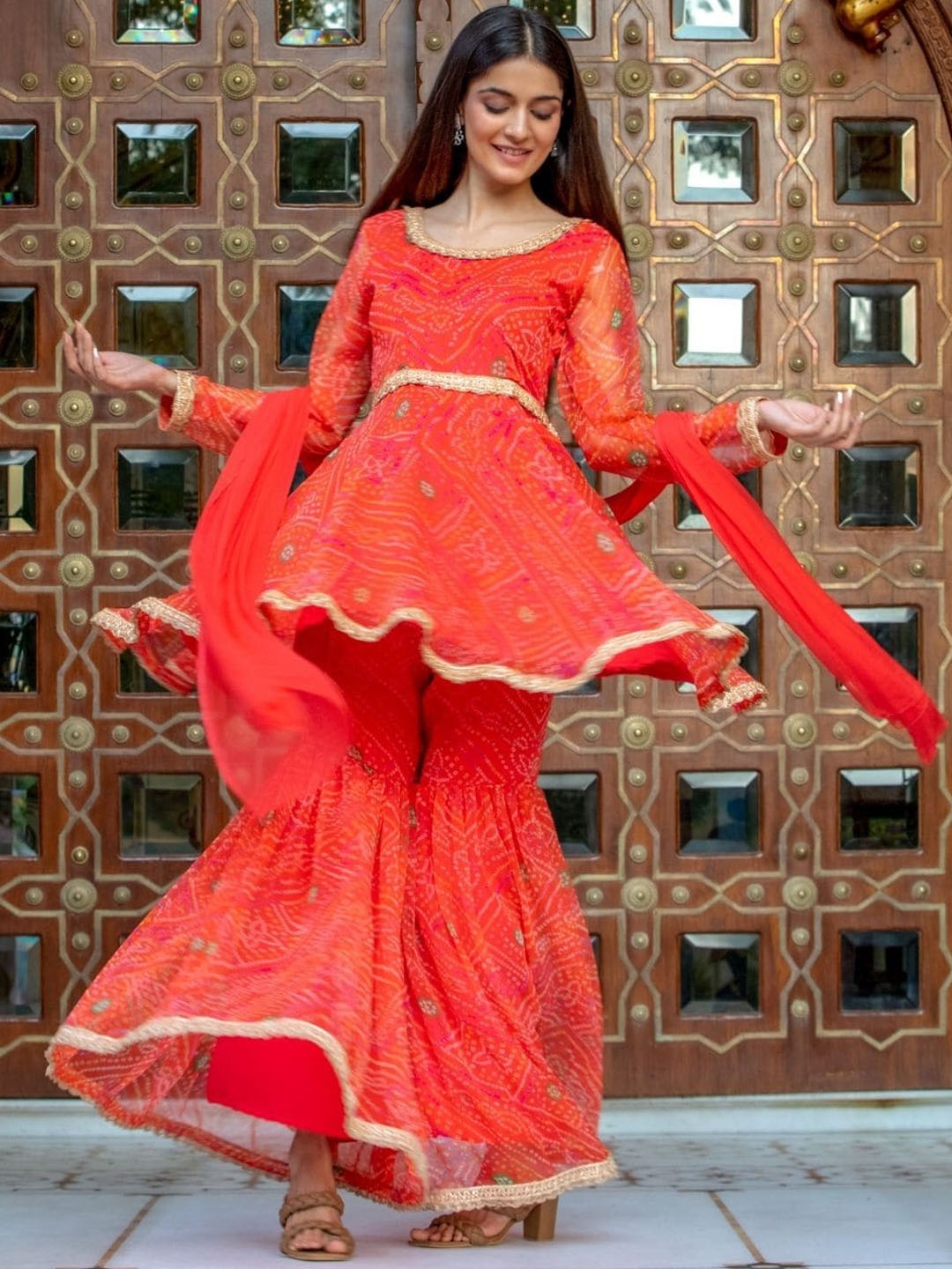 

HOUSE OF JAMOTI Women Bandhani Printed Pleated Kurti with Sharara & Dupatta, Orange