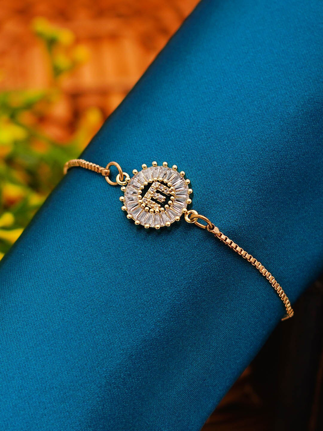 

Ferosh Women Crystal Studded E Alphabet Chain Bracelet, Gold