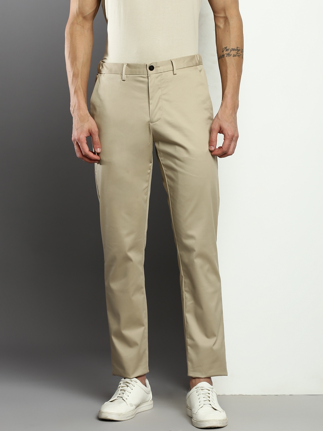 

Tommy Hilfiger Men Regular Fit Mid Rise Trousers, Beige