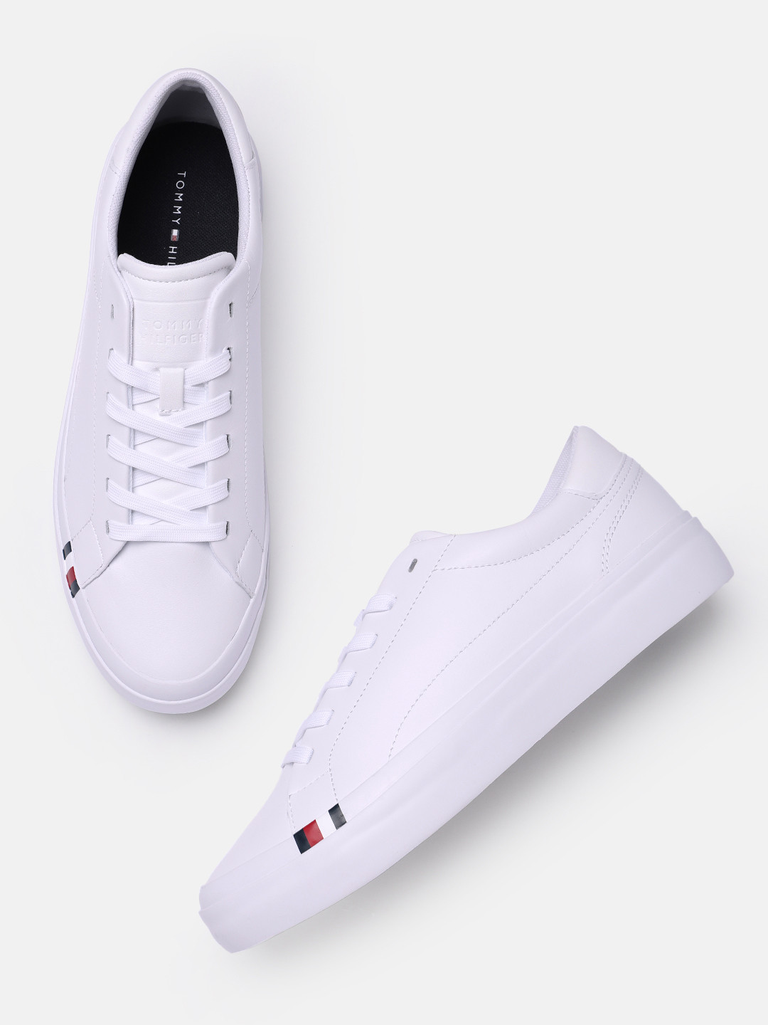 

Tommy Hilfiger Men Solid Regular Sneakers, White
