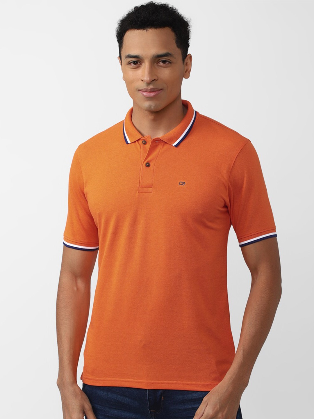 

Peter England Casuals Men Polo Collar T-shirt, Orange