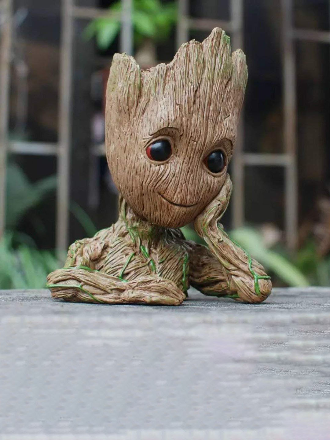 

Perpetual Brown & Green Coloured Patience Groot Idol Showpiece