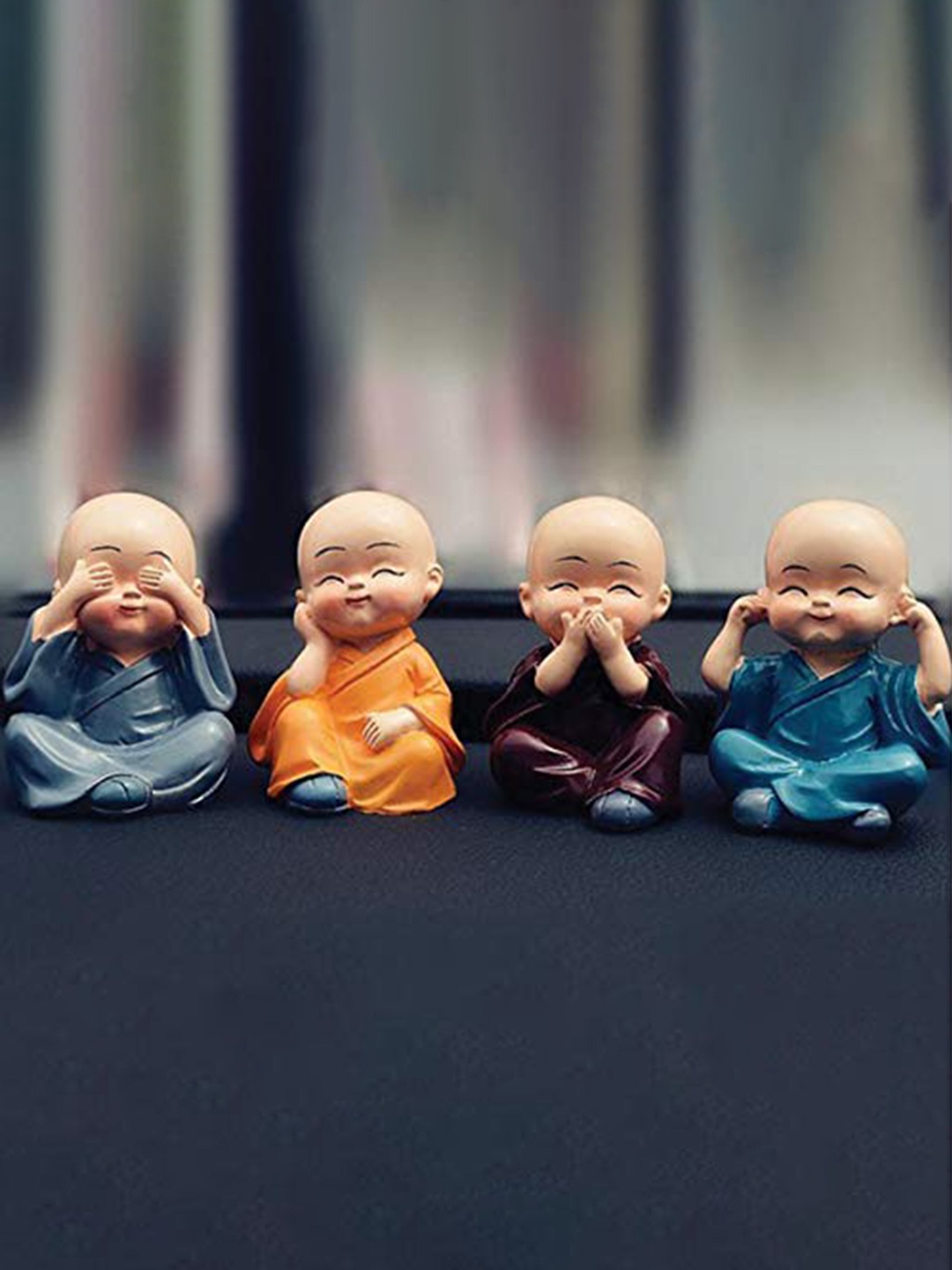

Perpetual 4 Pieces Baby Monk Buddha Showpieces, Blue
