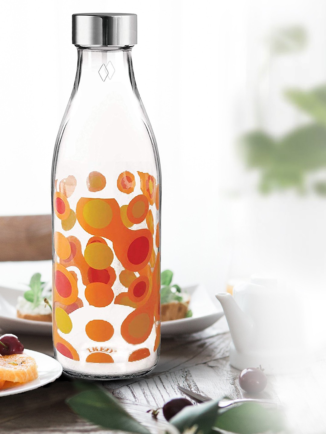 

Treo Ivory Premium Glass 2 Pieces Orange Circles Printed Bottles 1 L Each