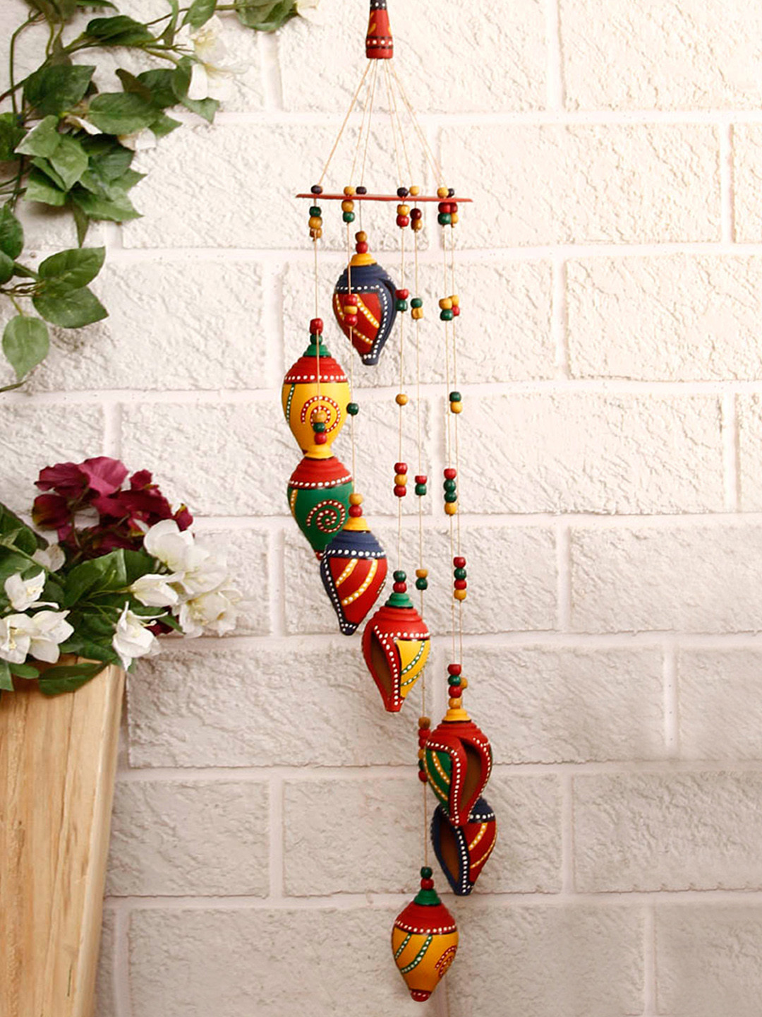 

ExclusiveLane Shankh Twirls Hand-Painted Terracotta Decorative Hanging Windchimes, Multi