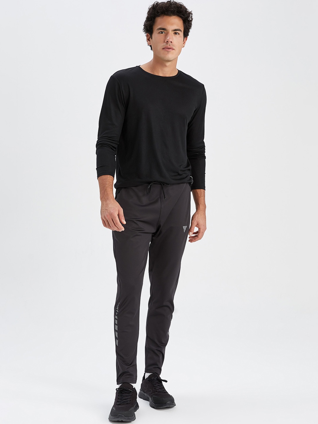 

DeFacto Men Solid Track Pants, Black