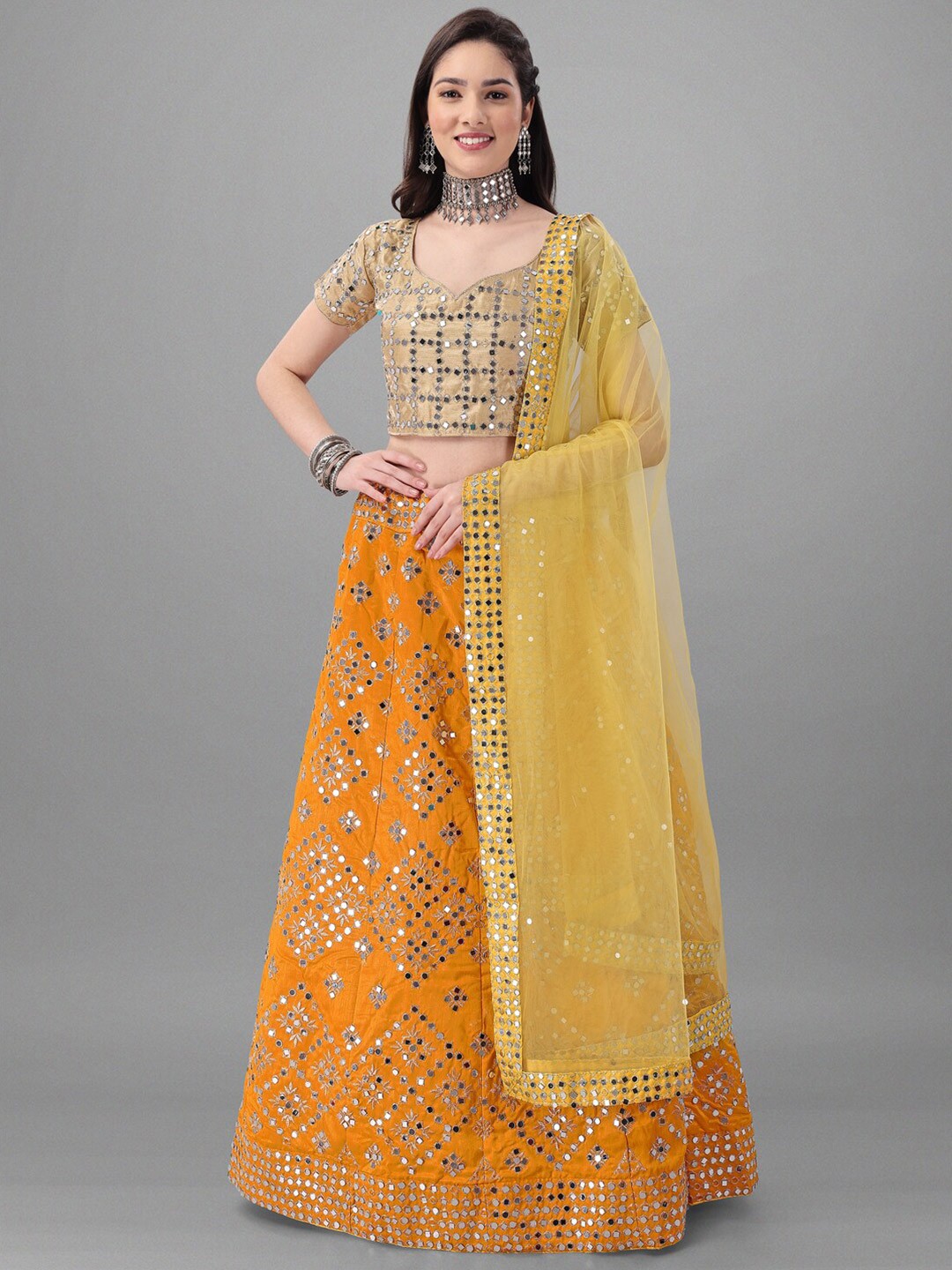 

Angroop Mustard & Silver-Toned Embellished Mirror Work Semi-Stitched Lehenga & Unstitched Blouse With