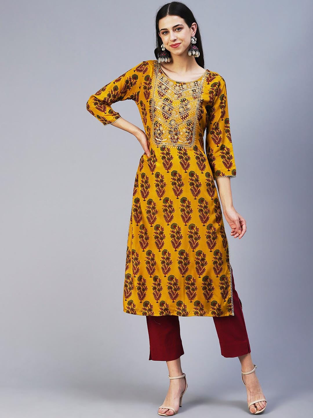 

FASHOR Women Printed Thread Work Round Neck Kurta, Mustard