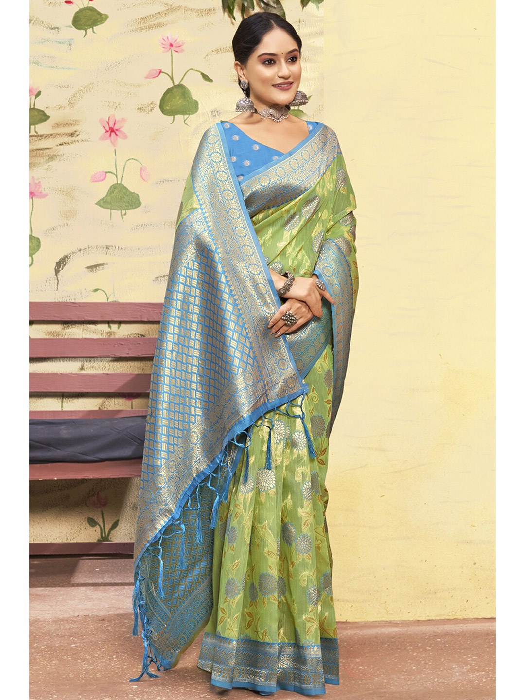

Exclusiva Green & Blue Woven Design Zari Pure Cotton Banarasi Saree