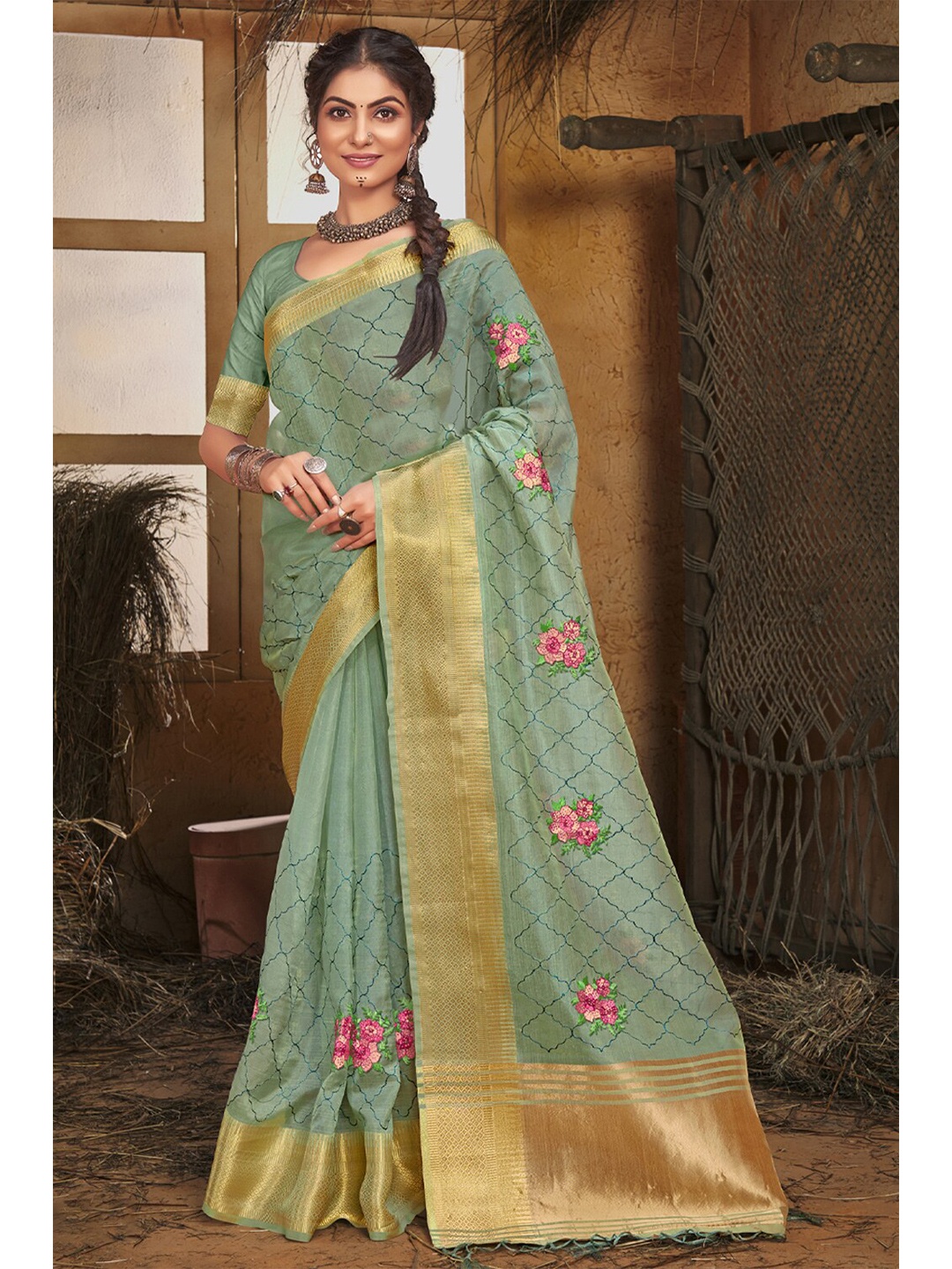 

Exclusiva Turquoise Blue & Green Woven Design Zari Organza Banarasi Saree