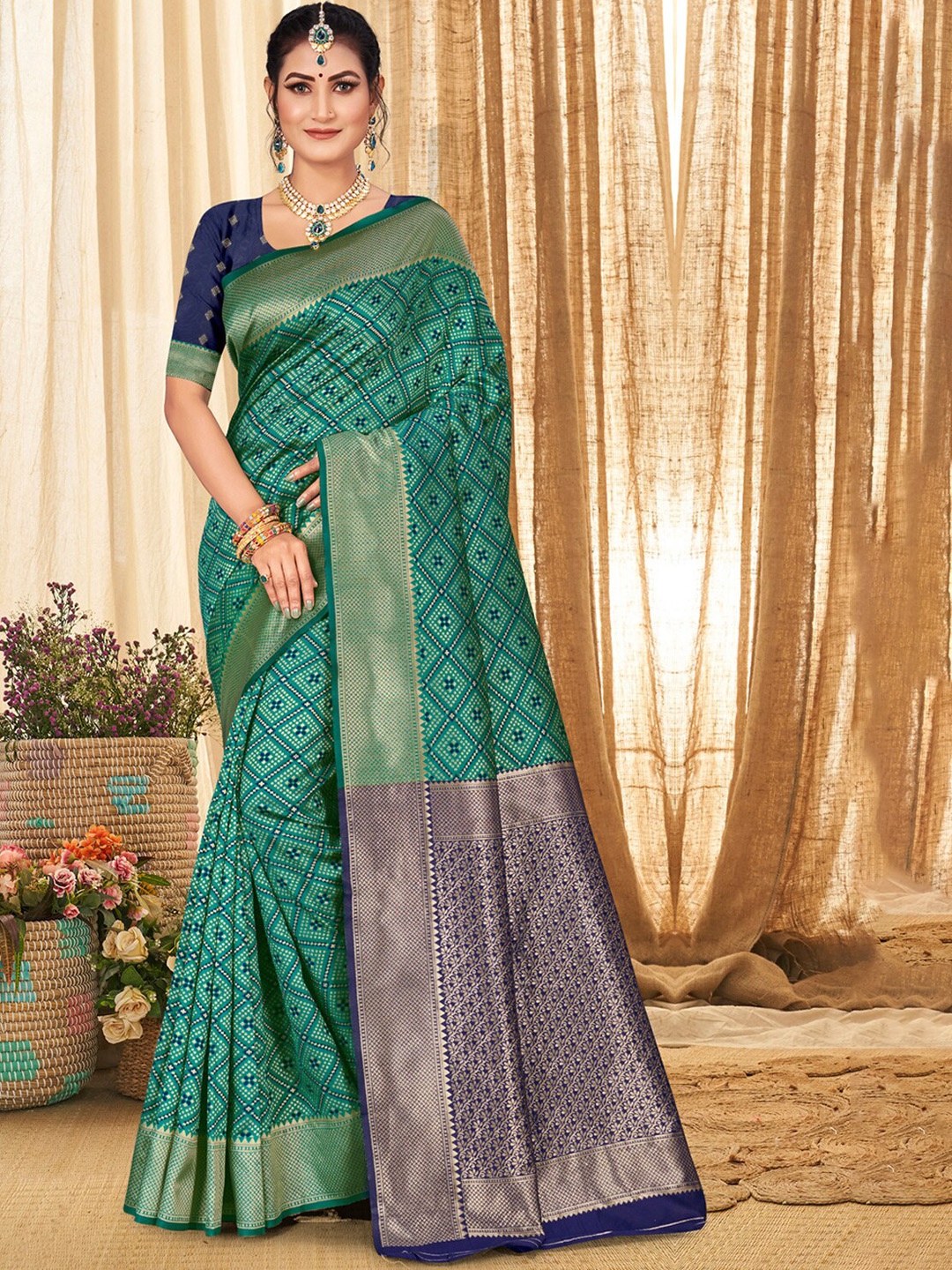 

Exclusiva Green & Blue Woven Design Zari Silk Blend Banarasi Saree