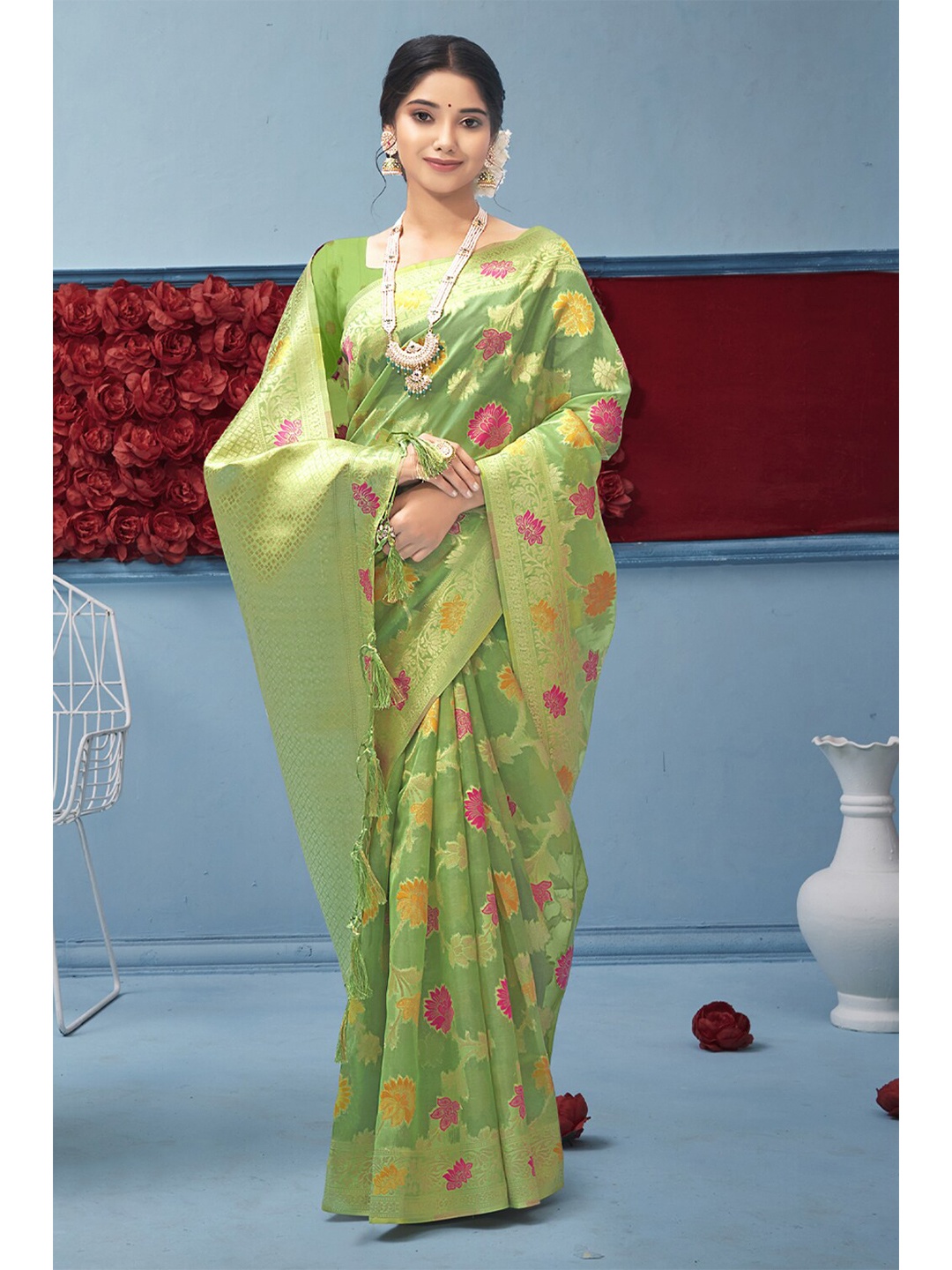 

Exclusiva Green & Mustard Woven Design Zari Organza Banarasi Saree