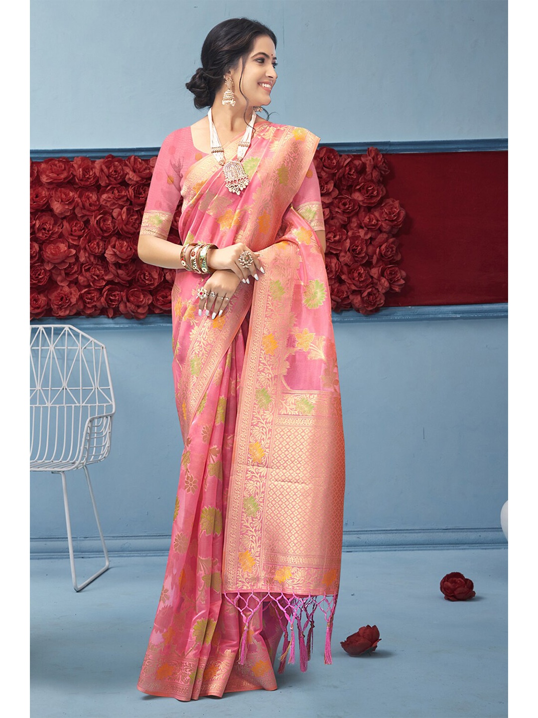 

Exclusiva Pink & Green Woven Design Zari Organza Banarasi Saree