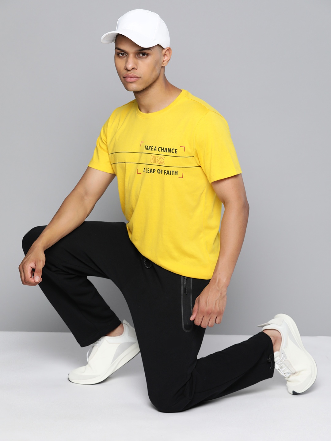 

HRX by Hrithik Roshan Men Brand Logo Printed T-shirt, Yellow