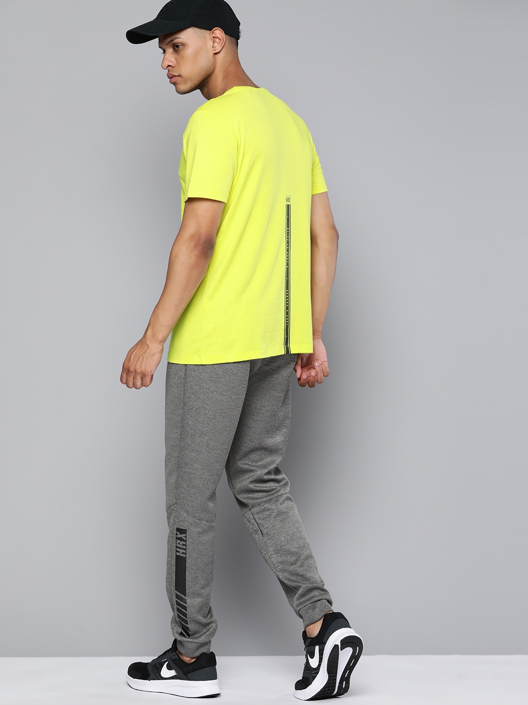 

HRX by Hrithik Roshan Men Solid T-shirt, Fluorescent green