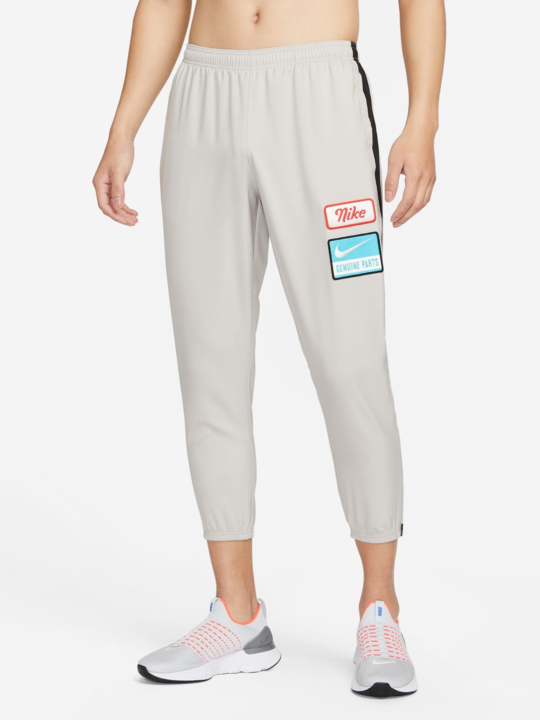 

Nike Men Grey Dri-FIT Challenger Trackpants, Taupe
