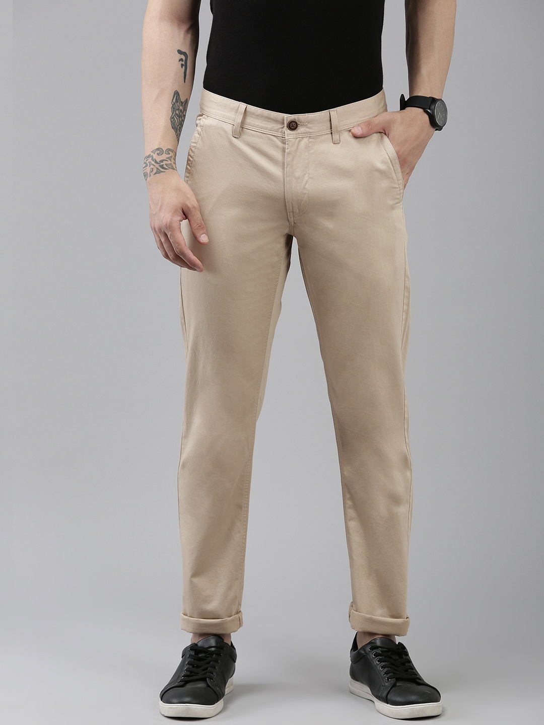 

Van Heusen Sport Men Pure Cotton Solid Slim Fit Mid-Rise Trousers, Beige