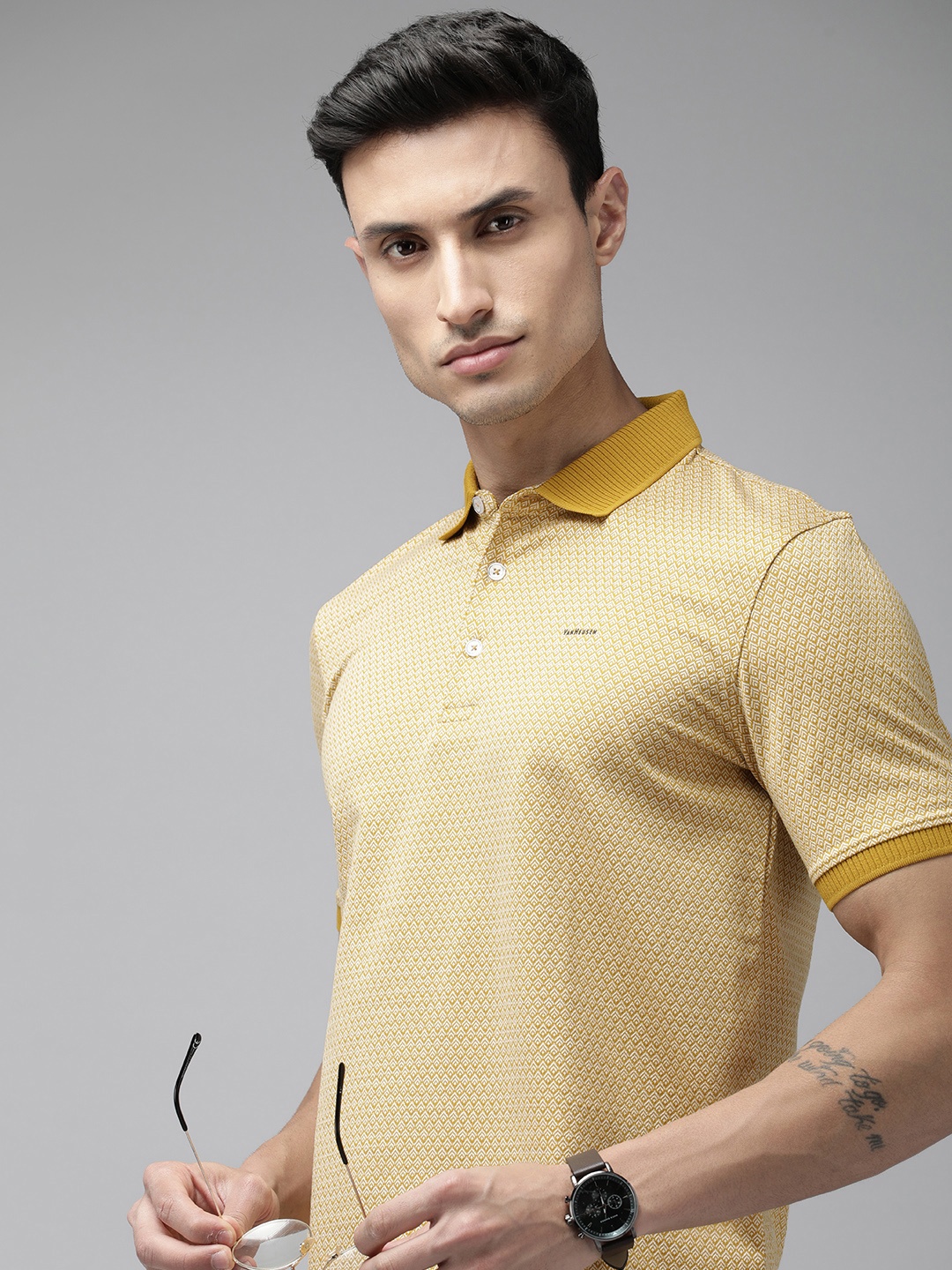 

Van Heusen Men Polo Collar Pure Cotton T-shirt, Mustard