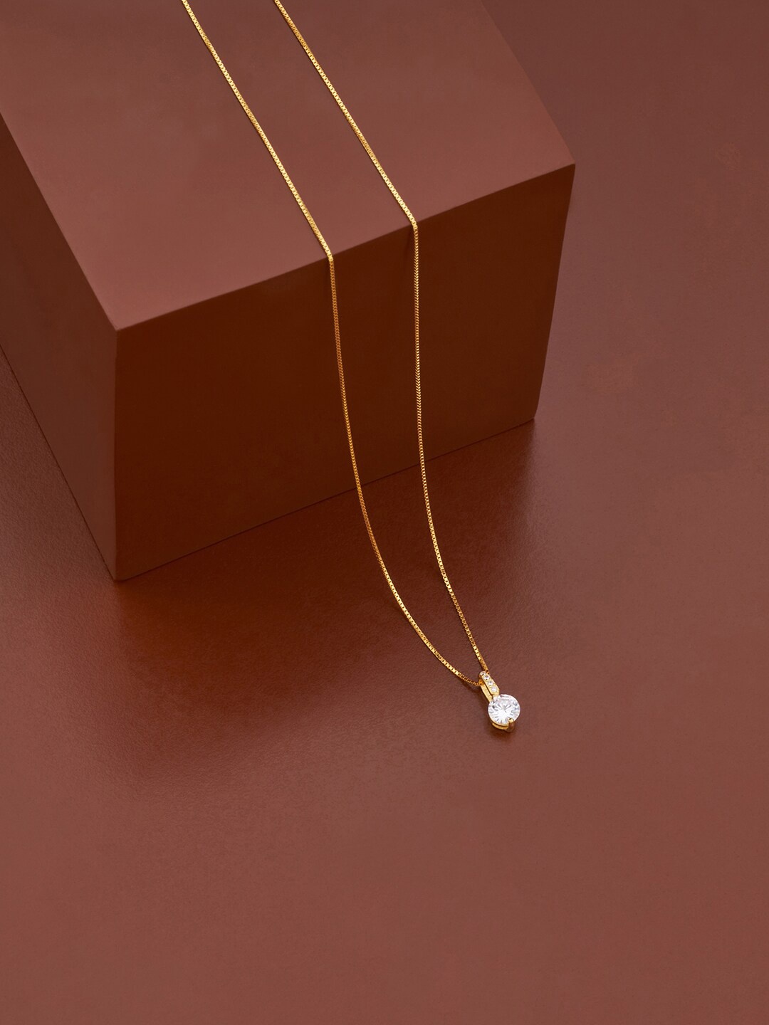 

Kushal's Fashion Jewellery Gold-Plated CZ Studded Pendant With Chain