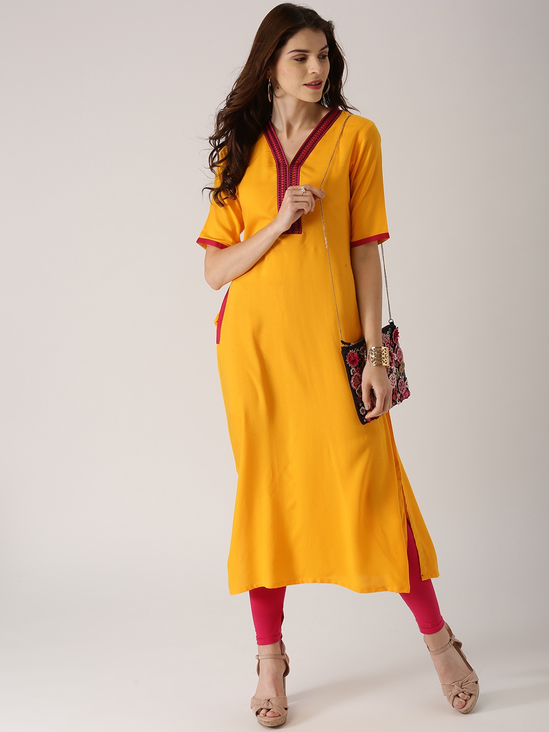 

Libas Women Yellow Solid Straight Kurta