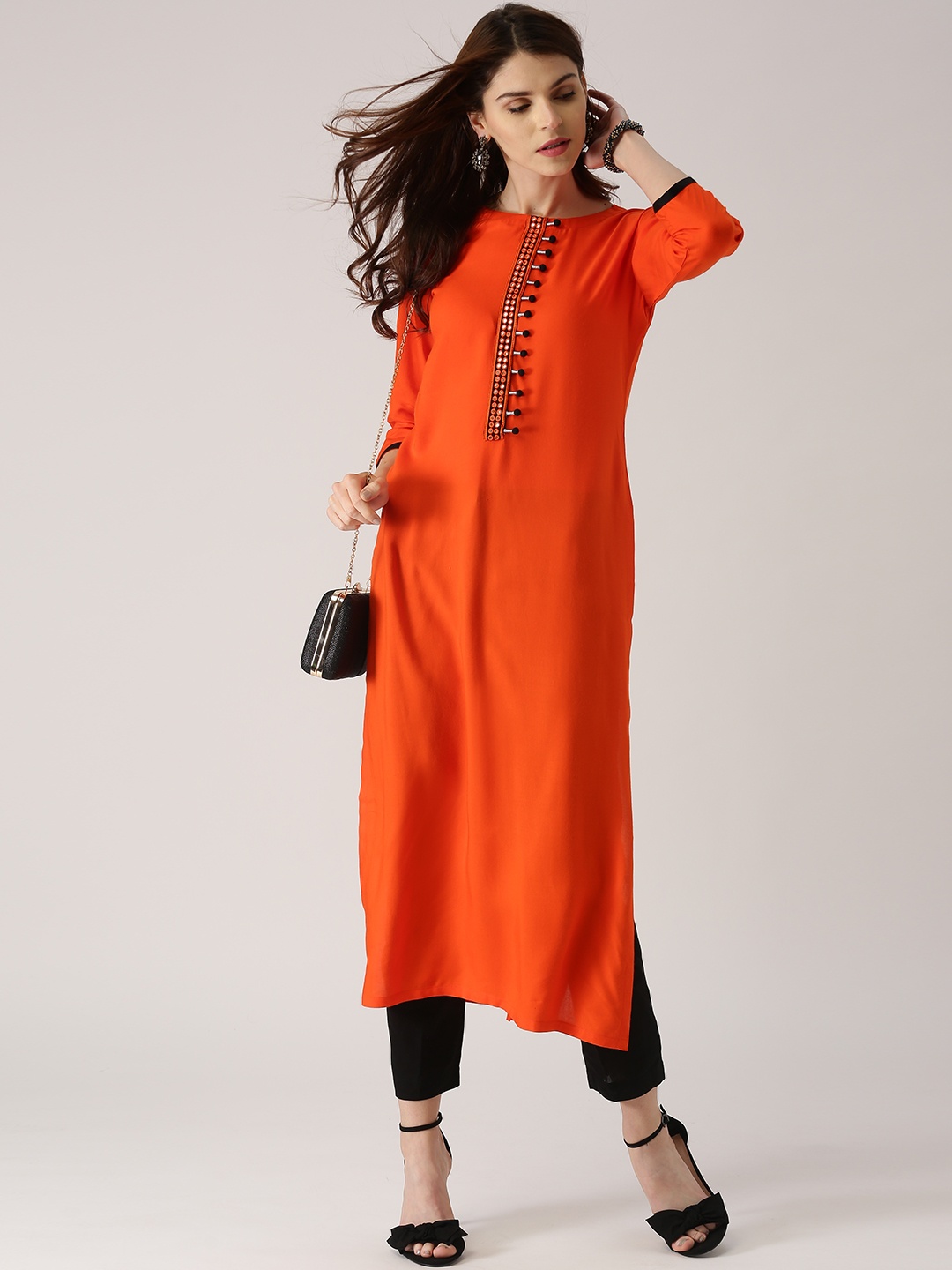 

Libas Women Orange Solid Straight Kurta
