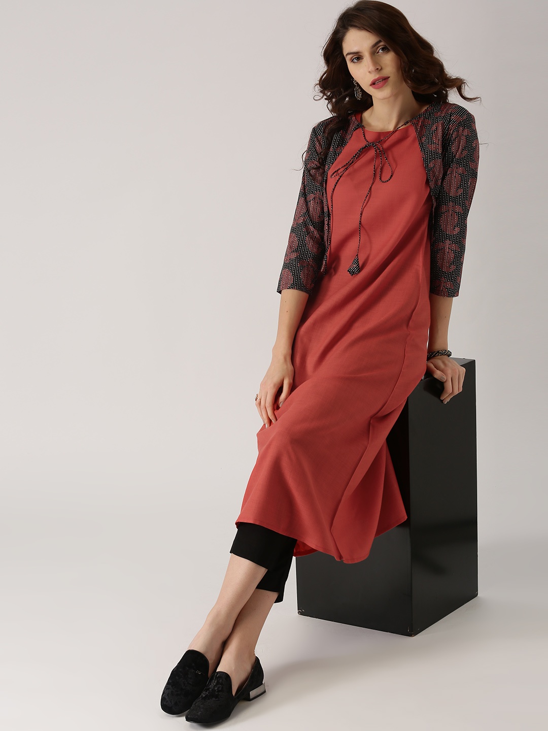 

Libas Women Coral Orange Solid A-Line Kurta