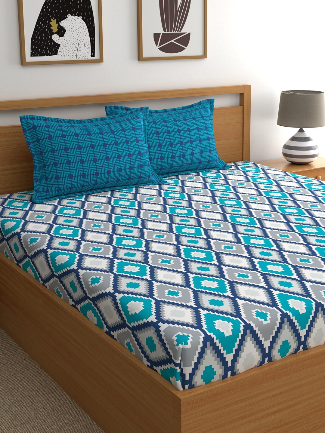 

Home Ecstasy Teal & White Printed 140 TC Queen Cotton Bedsheet with 2 Pillow Covers