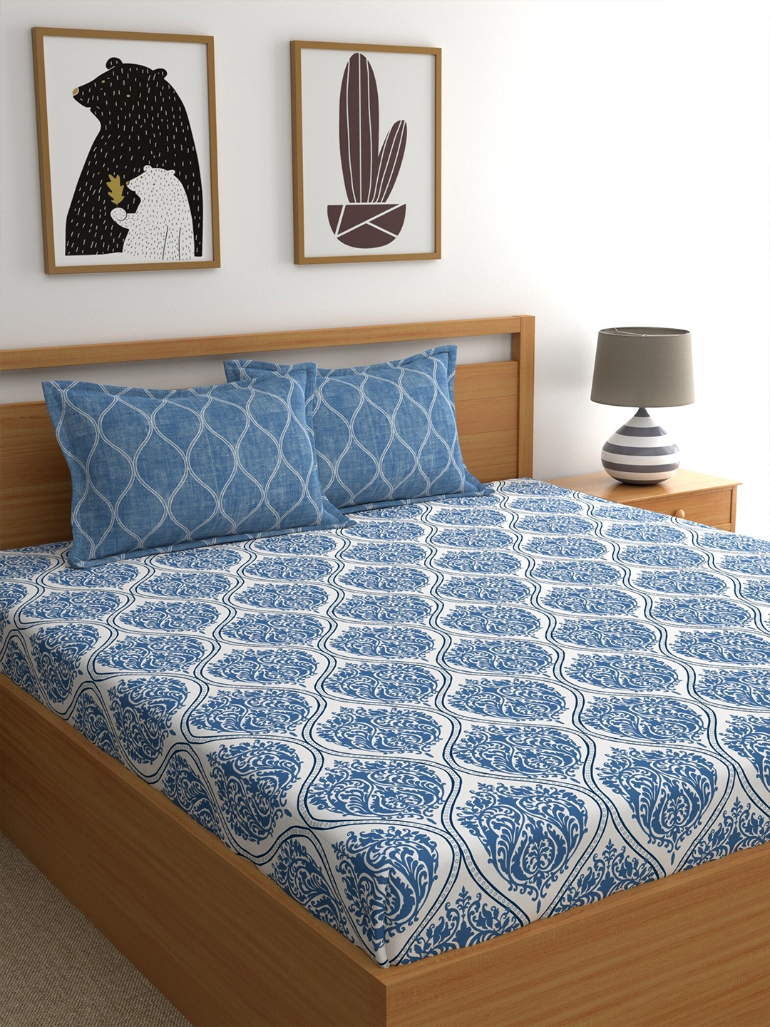

Home Ecstasy Blue & White Ethnic Motifs 140 TC Queen Cotton Bedsheet with 2 Pillow Covers