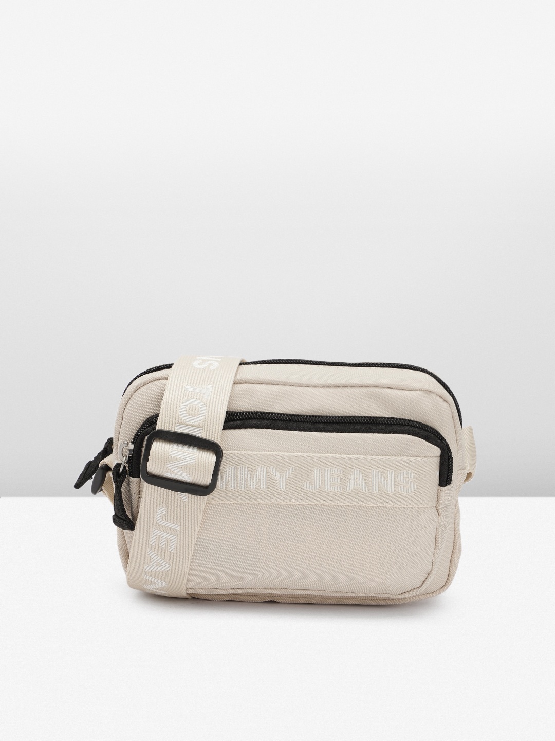 

Tommy Hilfiger Brand Logo Printed Sling Bag, Off white