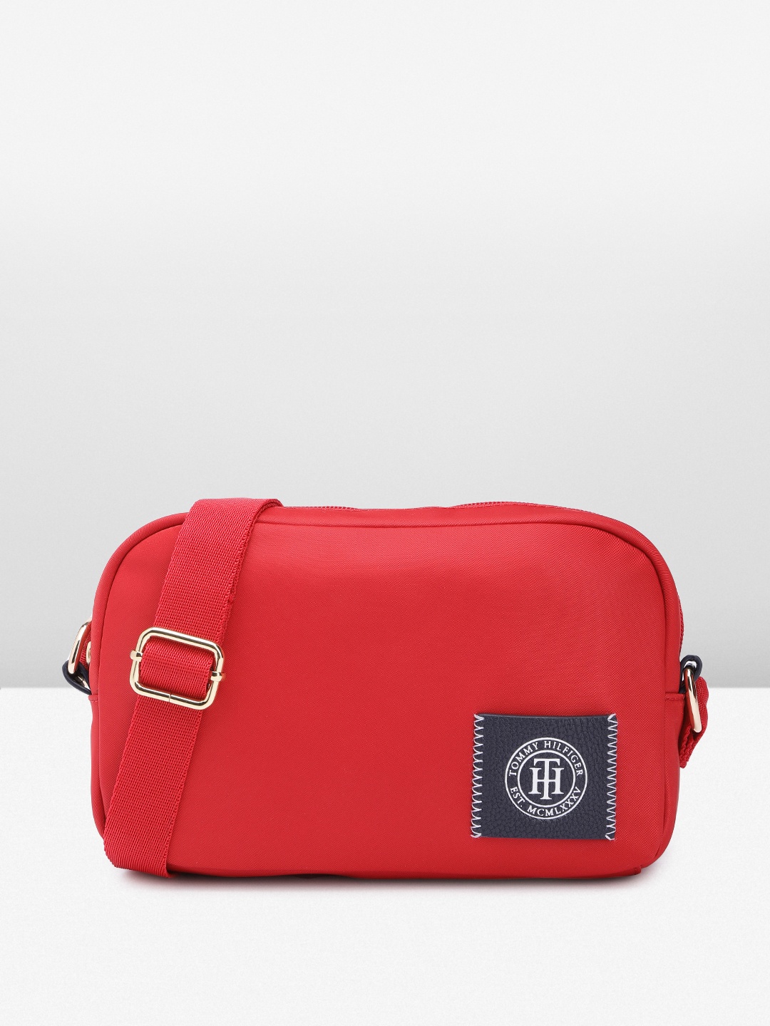 

Tommy Hilfiger Solid Structured Sling Bag with Brand Logo Applique, Red