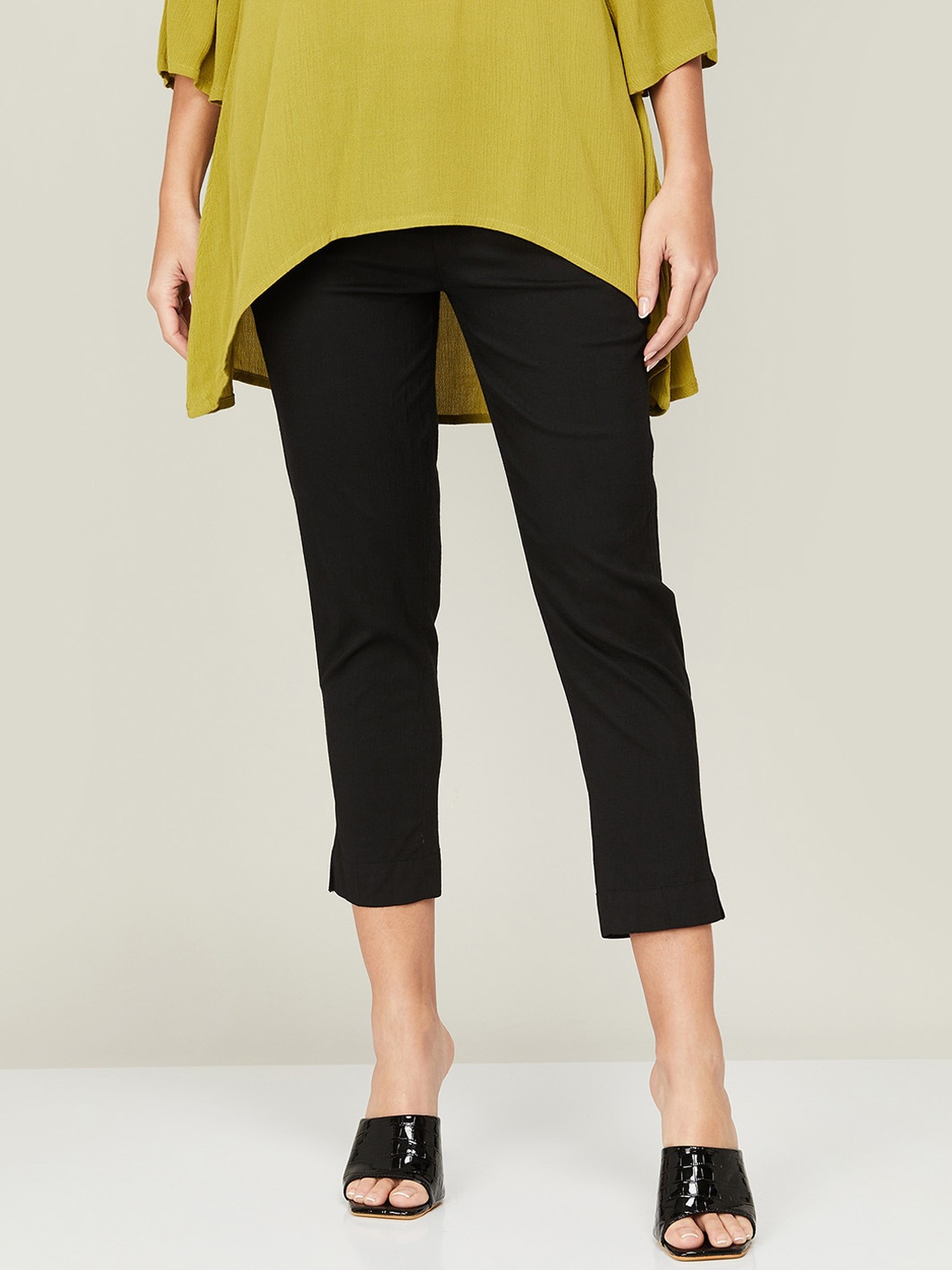 

Melange by Lifestyle Women Solid Mid-Rise Cropped Trousers, Black