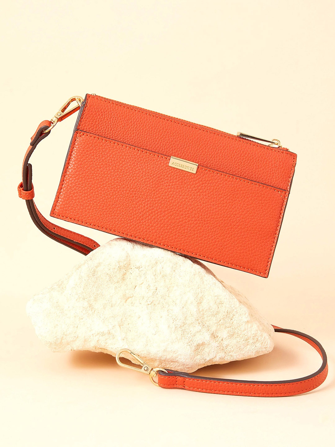 

Accessorize London Women's Faux Leather Orange Small Zip Sling Bag