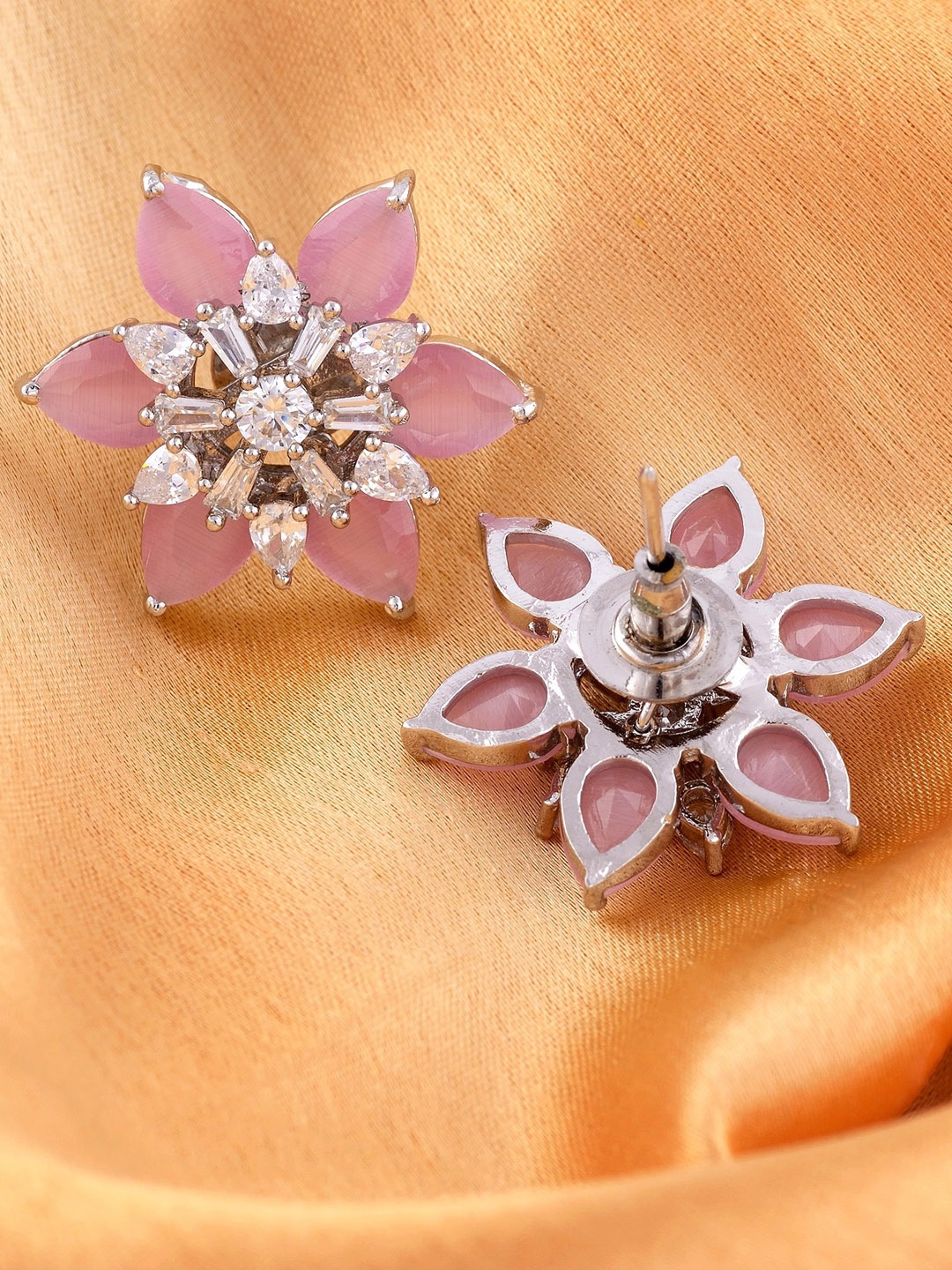 

Saraf RS Jewellery Rhodium Plated AD Studded Floral Studs Earrings, Pink