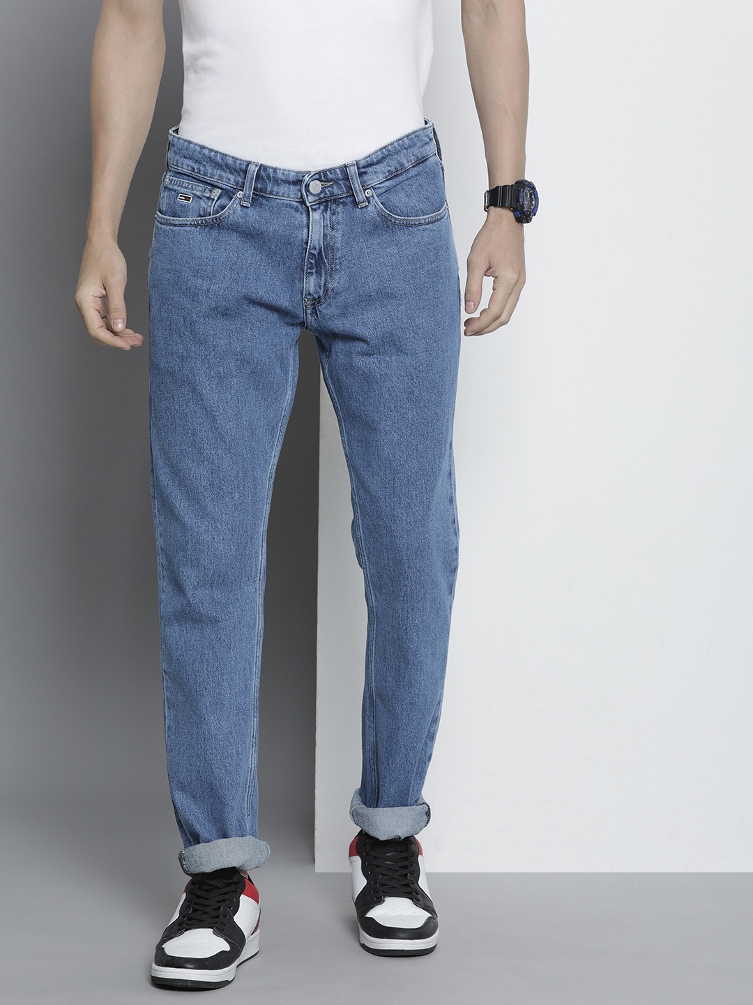 

Tommy Hilfiger Men Mid Rise Slim Fit Light Fade Jeans, Blue