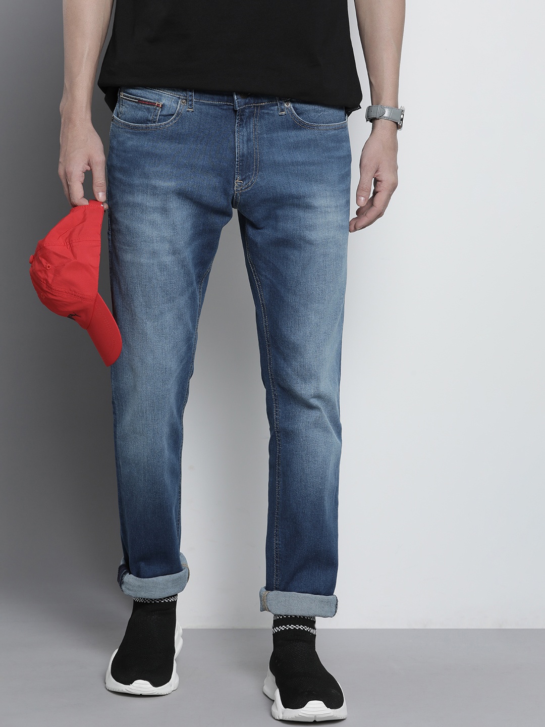 

Tommy Hilfiger Men Slim Fit Heavy Fade Stretchable Mid-Rise Jeans, Blue