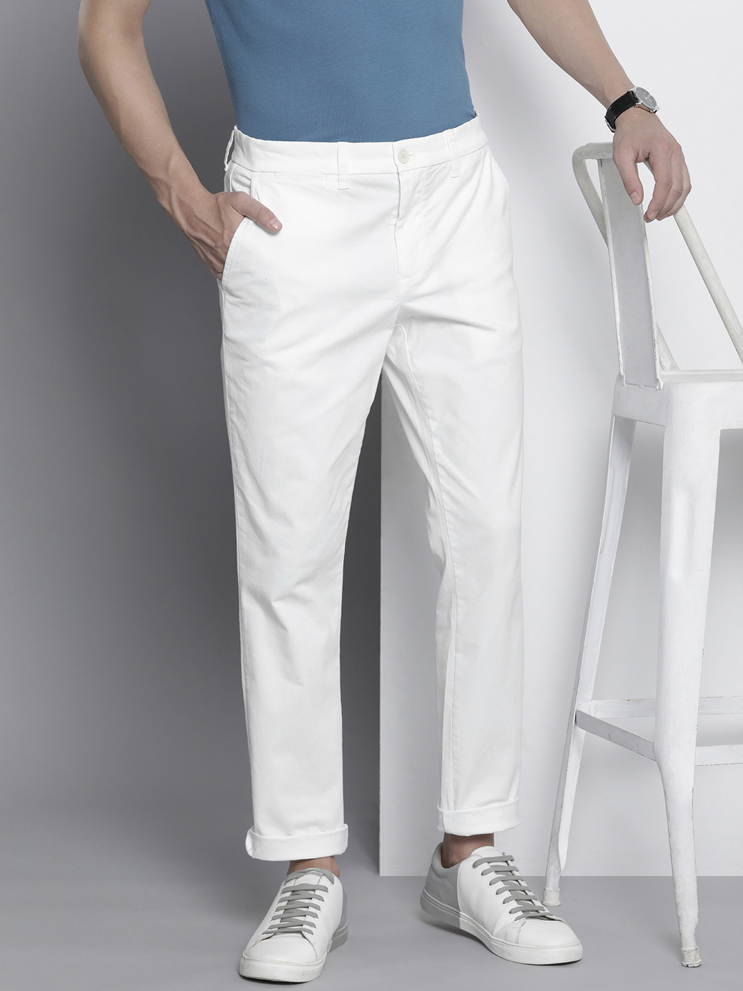

Tommy Hilfiger Men Solid Slim Fit Chinos Trousers, White