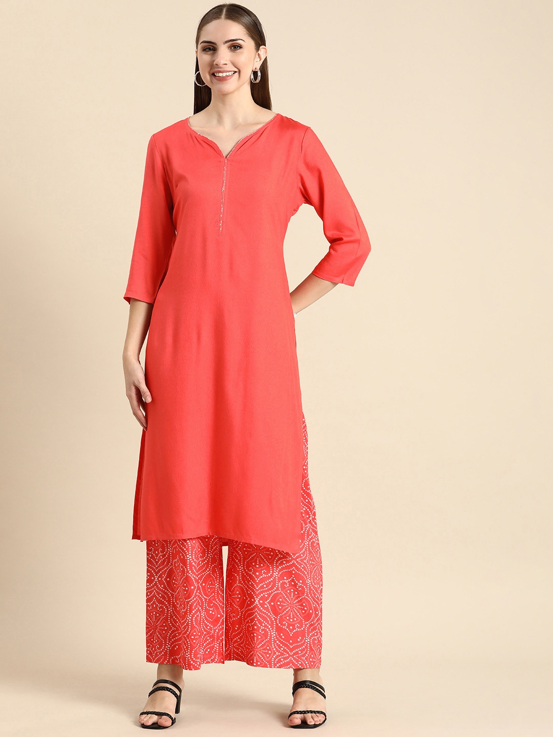 

Anouk Women Solid Regular Kurta With Printed Palazzos, Peach