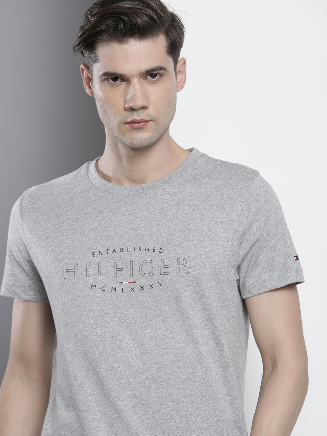 

Tommy Hilfiger Men Pure Cotton Brand Logo Printed Slim Fit T-shirt, Grey melange