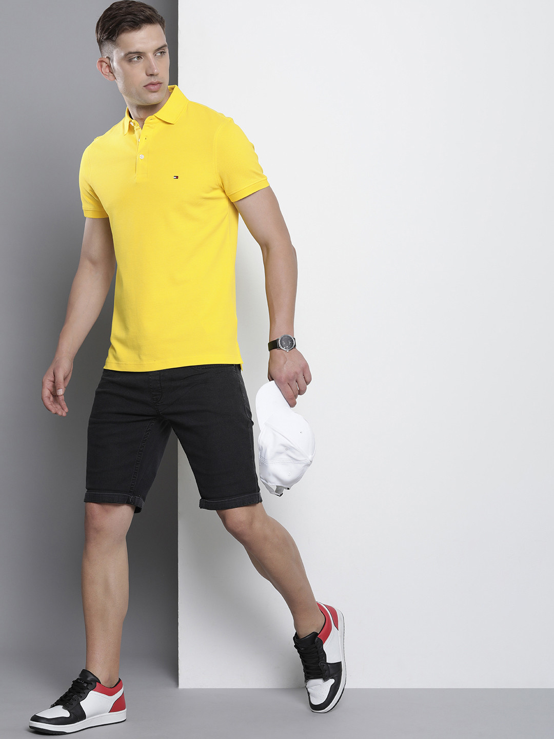 

Tommy Hilfiger Men Slim Fit Solid Polo Collar T-shirt, Yellow