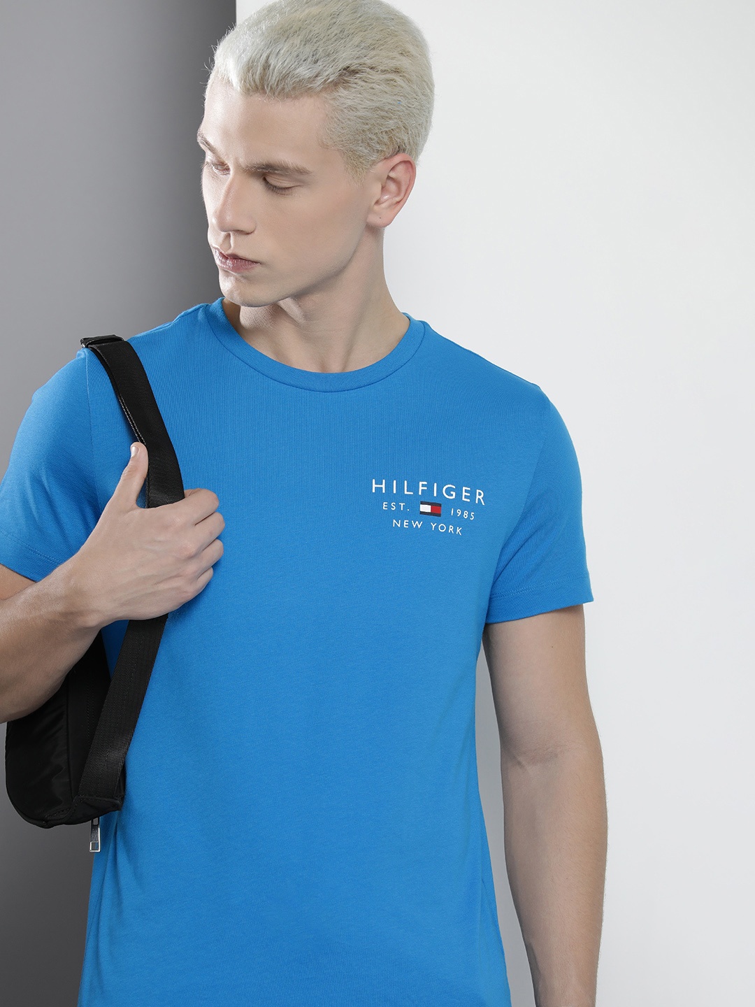 

Tommy Hilfiger Men Pure Cotton Brand Logo Printed Slim Fit T-shirt, Blue