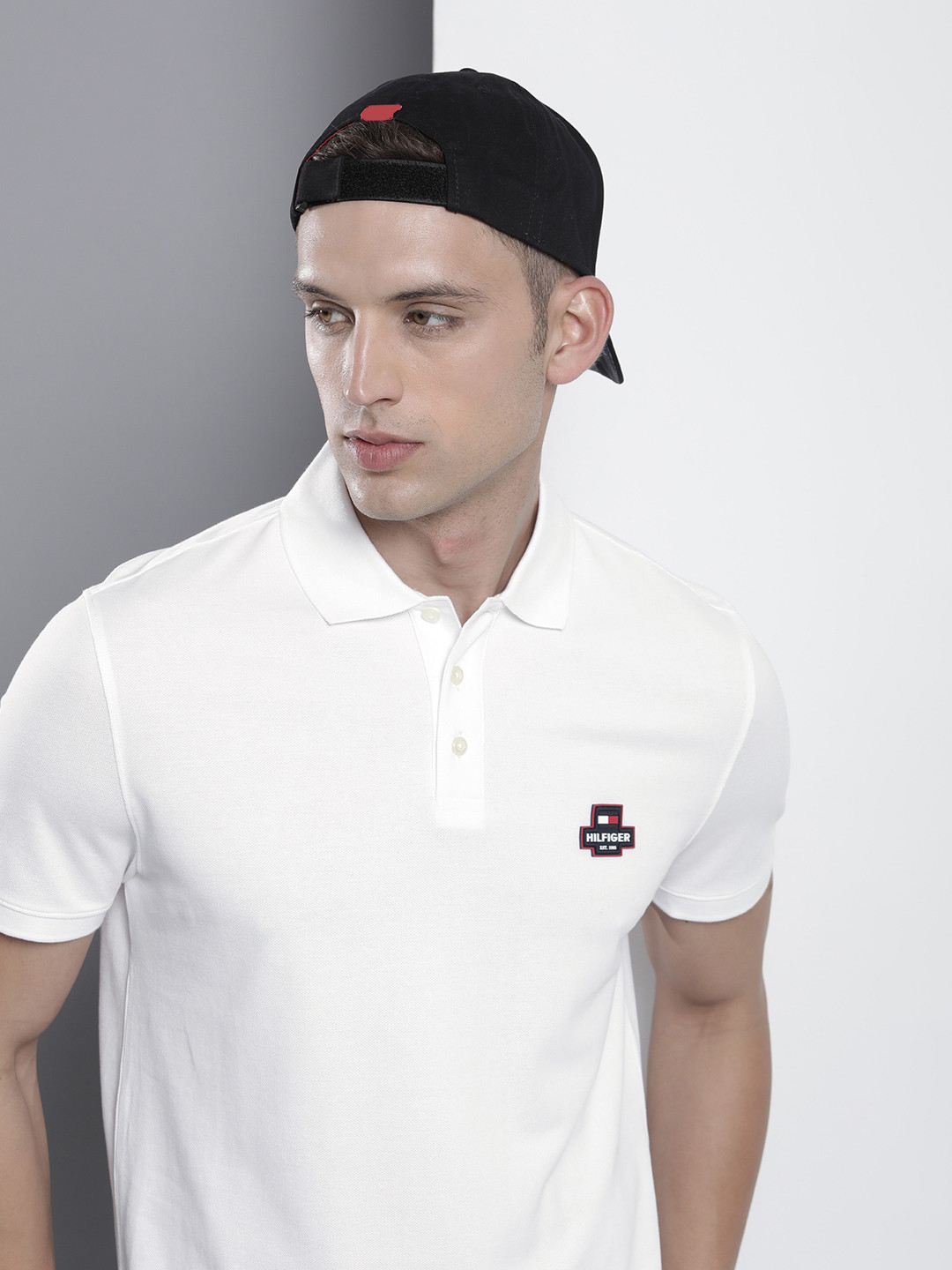 

Tommy Hilfiger Men Solid Polo Collar T-shirt With Applique Detail, White