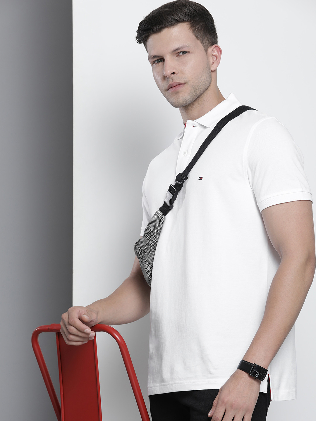 

Tommy Hilfiger Men Pure Cotton Solid Polo Collar T-shirt, White
