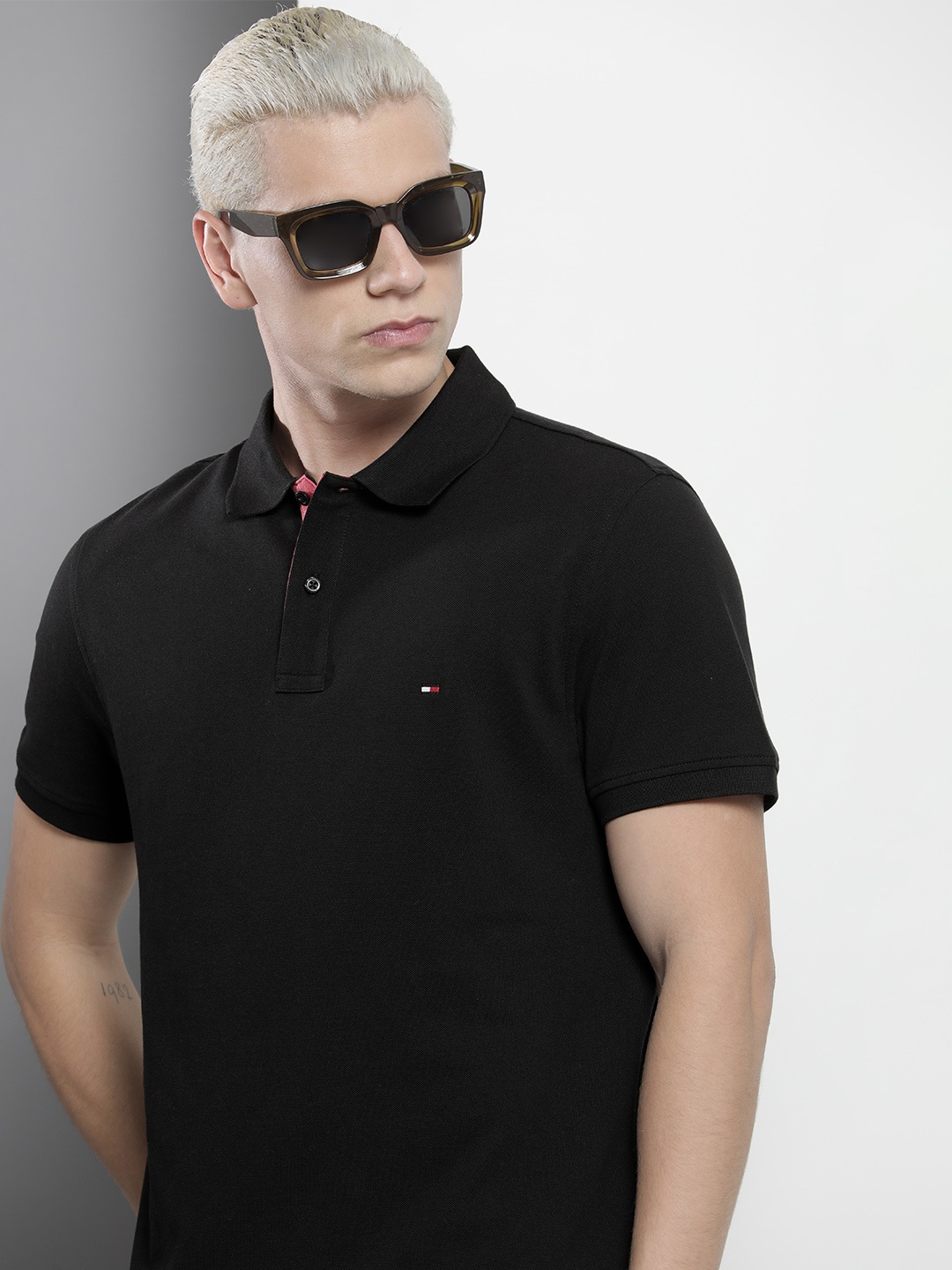 

Tommy Hilfiger Men Solid Polo Collar Knitted Organic Cotton T-shirt, Black