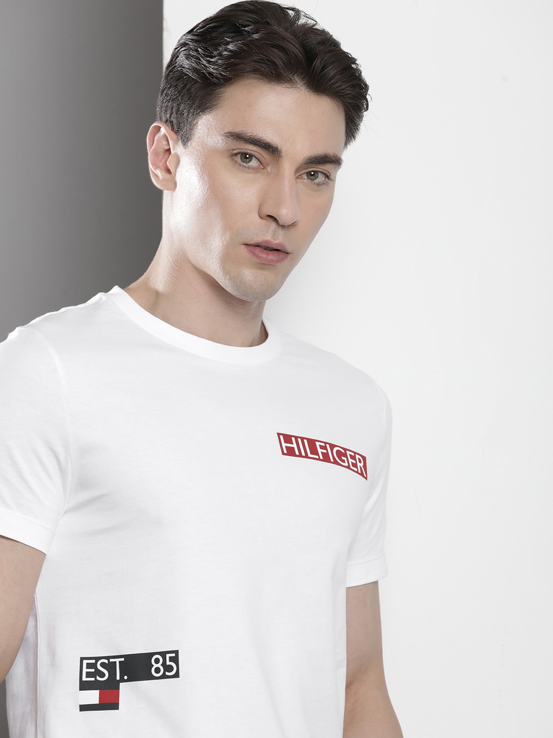 

Tommy Hilfiger Men Typography Printed Pure Cotton Slim Fit T-shirt, White