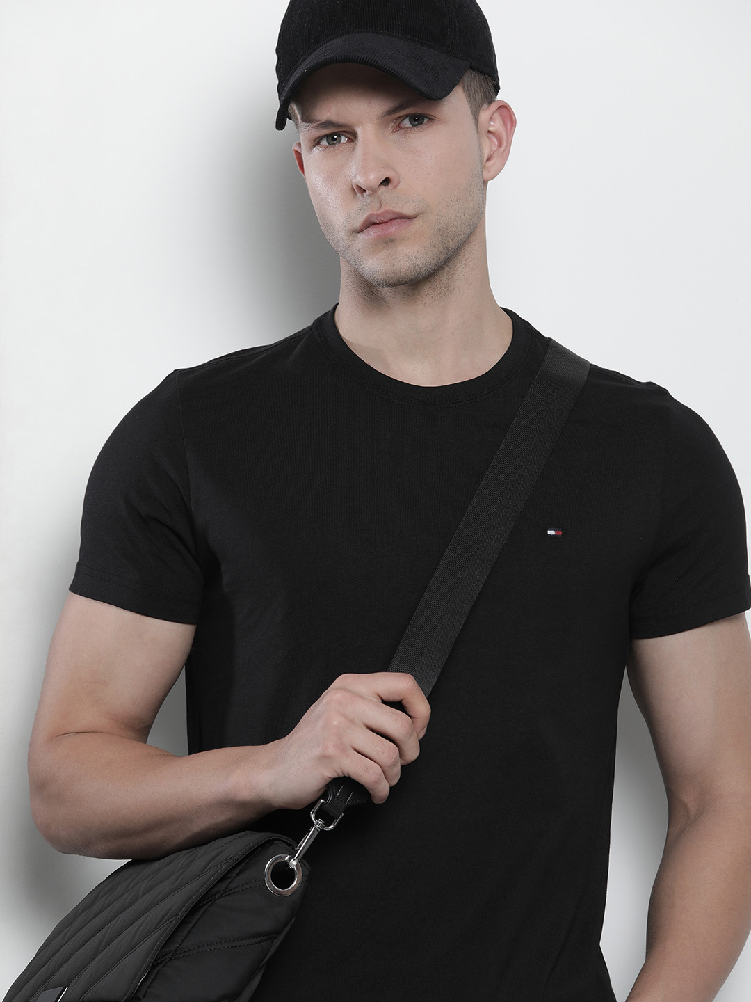 

Tommy Hilfiger Men Solid Pure Cotton Slim Fit T-shirt, Black