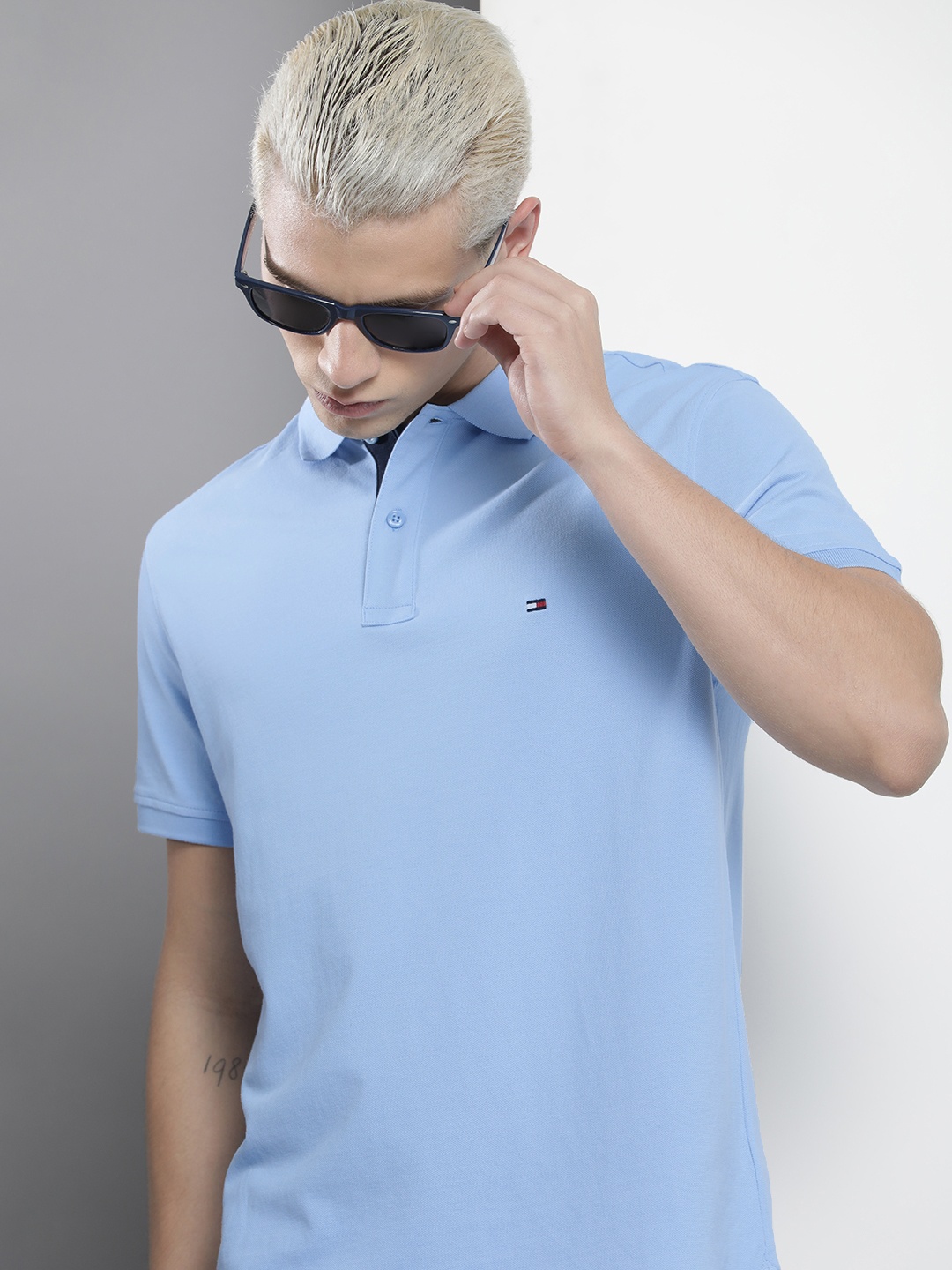

Tommy Hilfiger Men Solid Polo Collar Indigo Organic Cotton T-shirt, Blue
