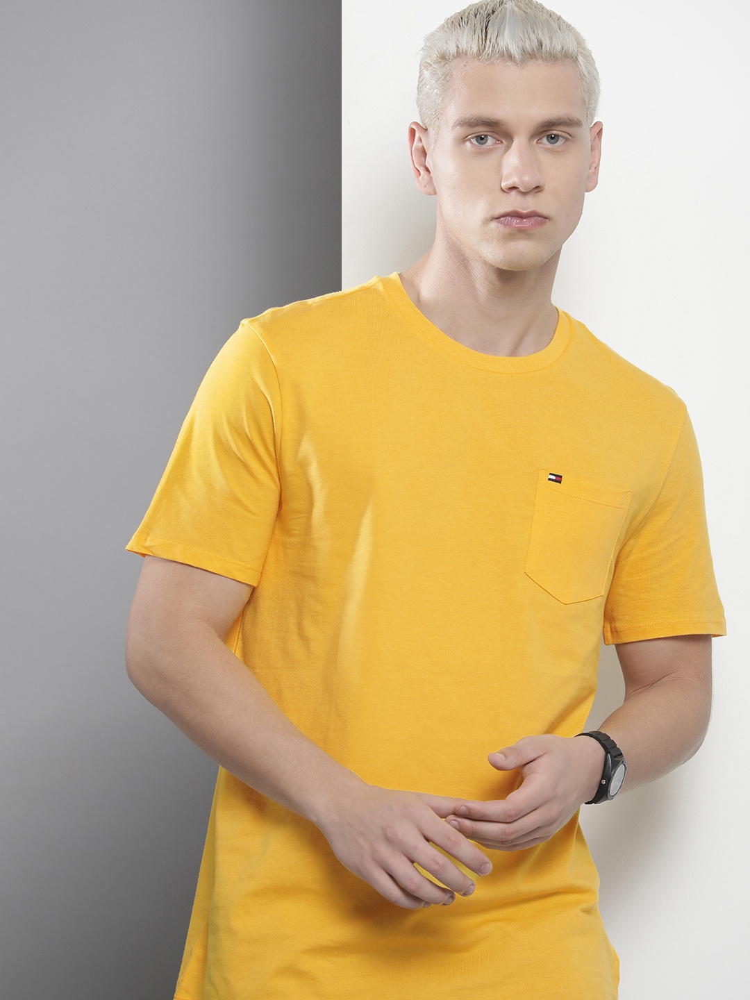 

Tommy Hilfiger Men Solid Pure Cotton T-shirt, Yellow