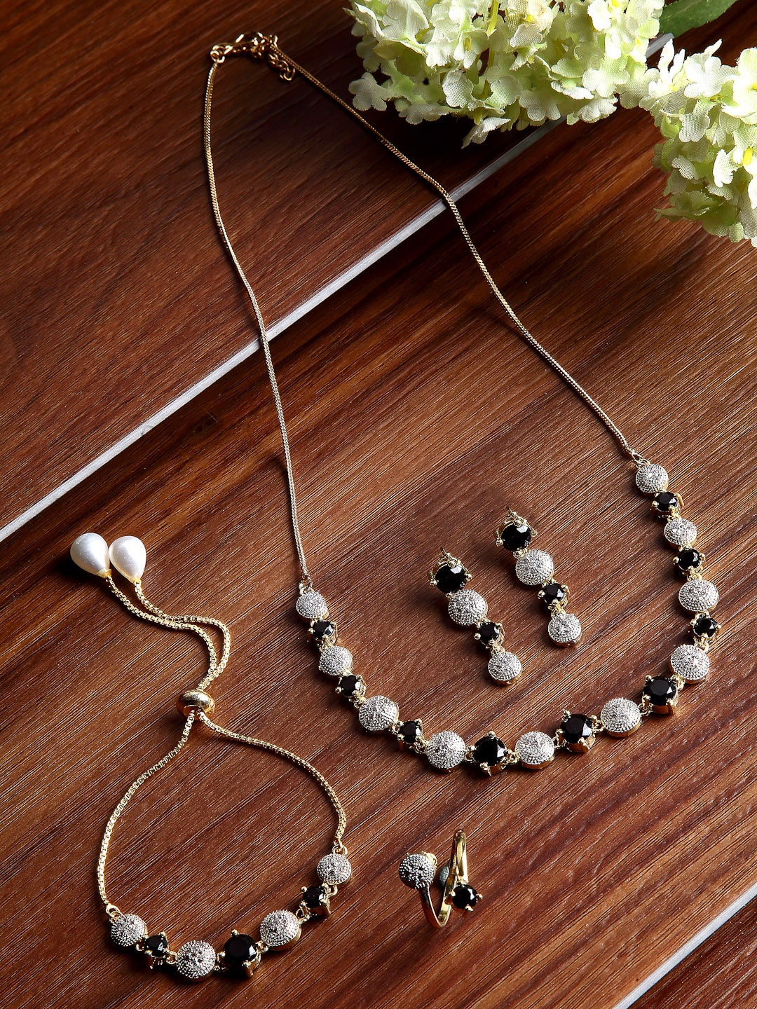 

Kennice Gold Plated Stone American Diamond Studded Jewellery Set, Black